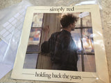 Simply Red : Holding Back The Years (7", Single)