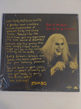 Rob Zombie, Zeuss : It's Zombo / The House Of Zombo (12", Single, Dlx, Whi)